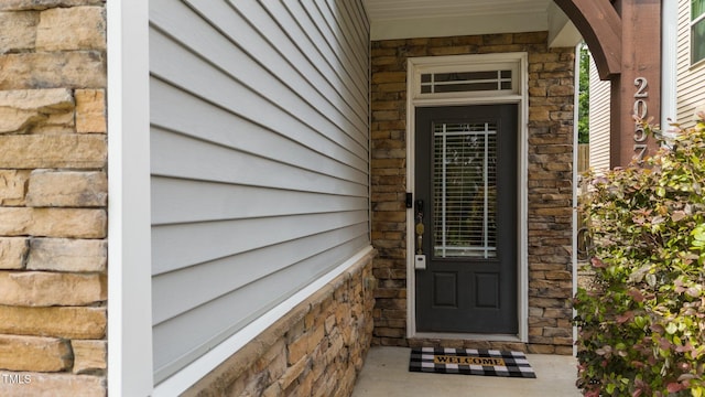 2057 Tanners Mill Dr, Durham, NC 27703 - property entrance with stone siding