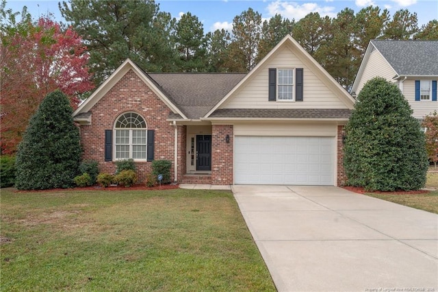 35 Shining Water Ln, Spring Lake, NC 28390 - traditional-style home with brick siding, concrete driveway, and a front lawn