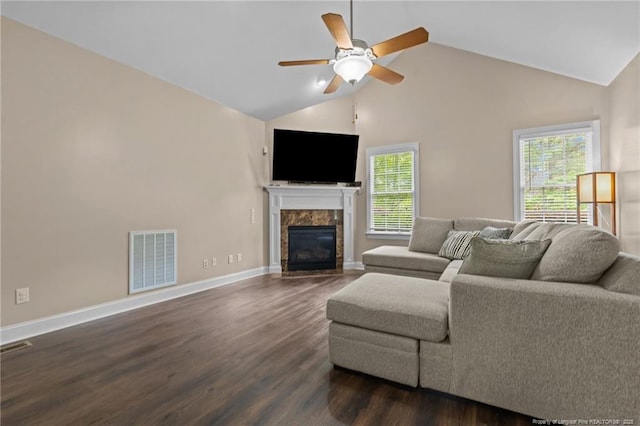35 Shining Water Ln, Spring Lake, NC 28390 - living area featuring ceiling fan, dark wood-type flooring, a premium fireplace, baseboards, and high vaulted ceiling