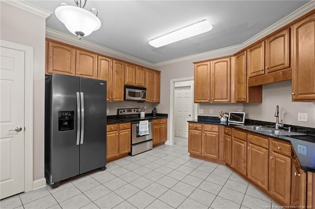 35 Shining Water Ln, Spring Lake, NC 28390 - kitchen featuring appliances with stainless steel finishes, a sink, crown molding, brown cabinets, and light tile patterned floors