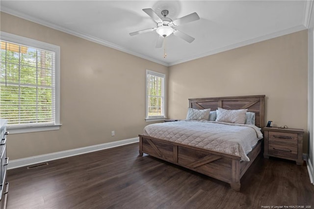35 Shining Water Ln, Spring Lake, NC 28390 - bedroom with baseboards, dark wood finished floors, ornamental molding, and multiple windows