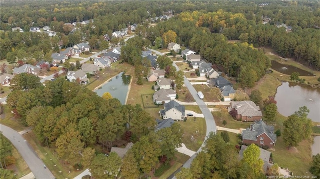 35 Shining Water Ln, Spring Lake, NC 28390 - aerial overview of property's location featuring a nearby body of water, nearby suburban area, and a heavily wooded area