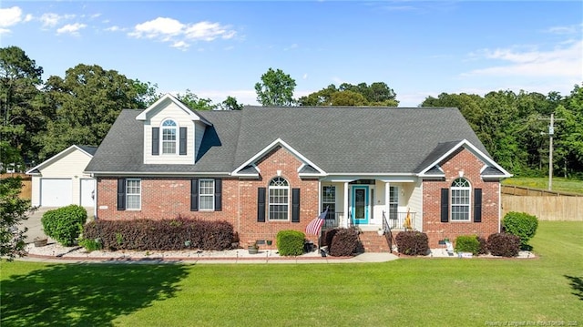 view of front of house with brick siding and an outbuilding