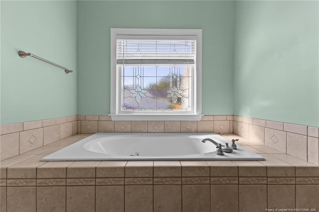full bathroom featuring a garden tub