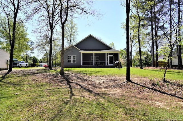 120 Will Lucas Rd, Linden, NC 28356 - back of property with a sunroom and a yard