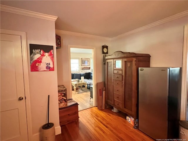 12558 Mcdougald Rd, Broadway, NC 27505 - hallway with light wood-style floors and crown molding