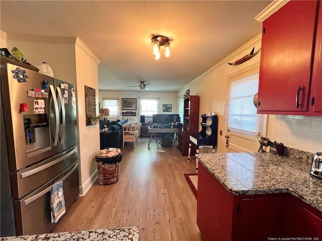 12558 Mcdougald Rd, Broadway, NC 27505 - kitchen with stainless steel fridge, light wood-type flooring, ornamental molding, a ceiling fan, and tasteful backsplash