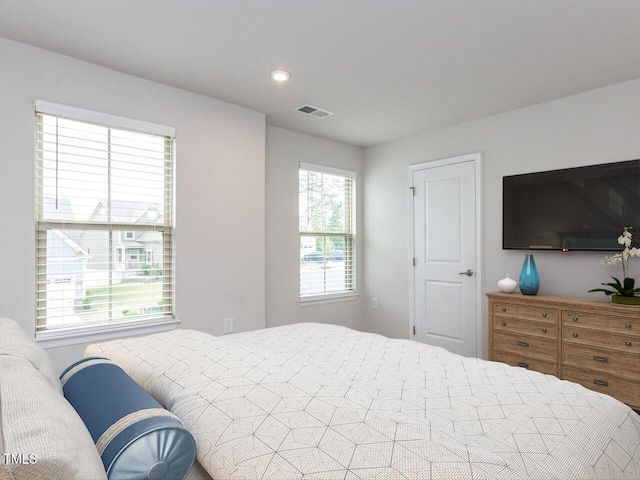 bedroom featuring recessed lighting