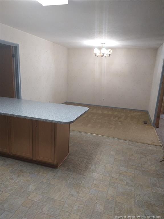 1829 Martindale Dr, Fayetteville, NC 28304 - unfurnished dining area featuring a chandelier