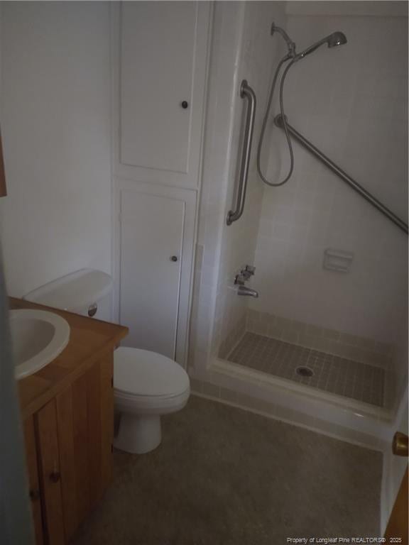 1829 Martindale Dr, Fayetteville, NC 28304 - full bathroom featuring a shower stall, toilet, and vanity