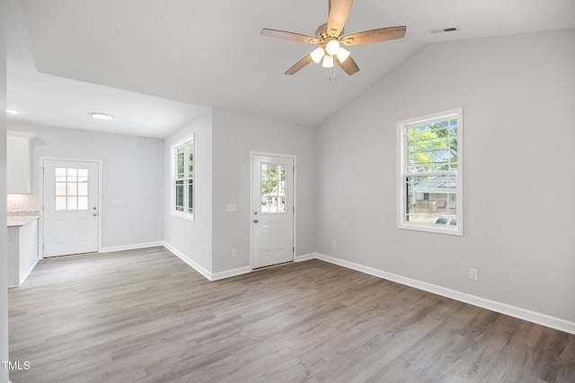 208 W Holt St, Burlington, NC 27217 - foyer featuring light wood finished floors, a ceiling fan, baseboards, and vaulted ceiling