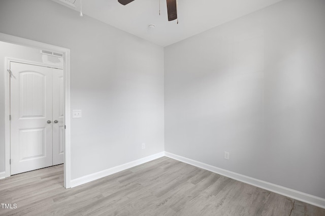 208 W Holt St, Burlington, NC 27217 - empty room featuring ceiling fan, light wood-type flooring, and baseboards