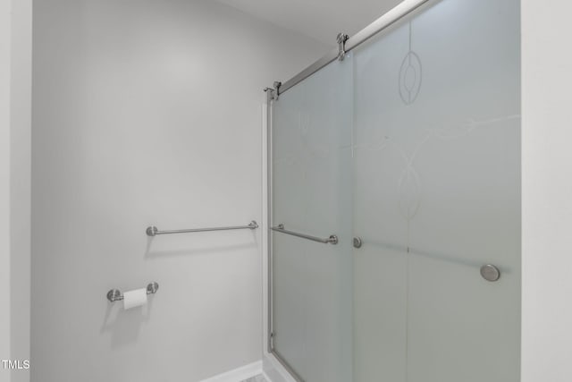 bathroom with an enclosed shower