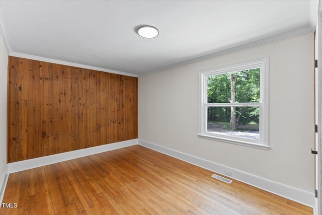 4713 Erwin Rd, Durham, NC 27705 - unfurnished room featuring baseboards, light wood-style floors, and ornamental molding
