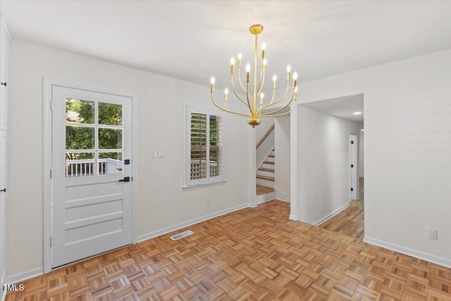 4713 Erwin Rd, Durham, NC 27705 - unfurnished dining area featuring a chandelier, stairway, and baseboards