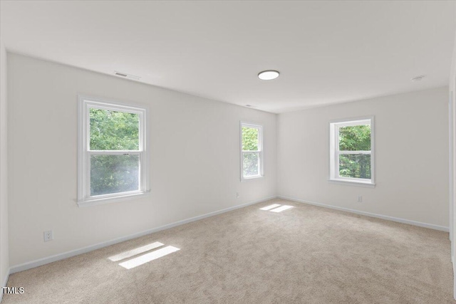 4713 Erwin Rd, Durham, NC 27705 - empty room with carpet flooring and baseboards
