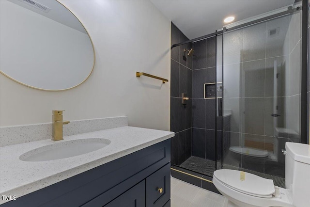 4713 Erwin Rd, Durham, NC 27705 - full bath with toilet, vanity, a shower stall, tile patterned floors, and recessed lighting
