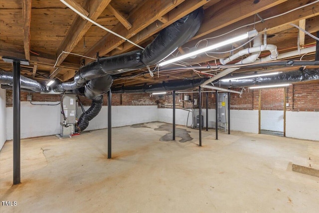 4713 Erwin Rd, Durham, NC 27705 - unfinished below grade area with water heater