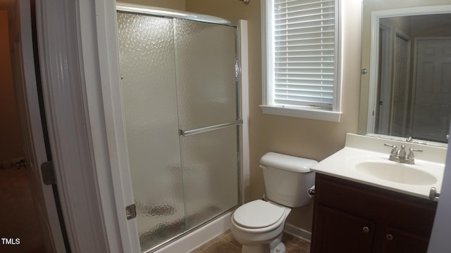 919 Middle Ground Ave, Rolesville, NC 27571 - bathroom with a shower stall, vanity, toilet, and tile patterned flooring