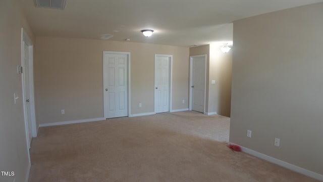 919 Middle Ground Ave, Rolesville, NC 27571 - spare room featuring light carpet and baseboards