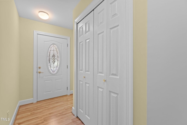 4705 Forest Highland Dr, Raleigh, NC 27604 - doorway to outside with baseboards and light wood-style flooring