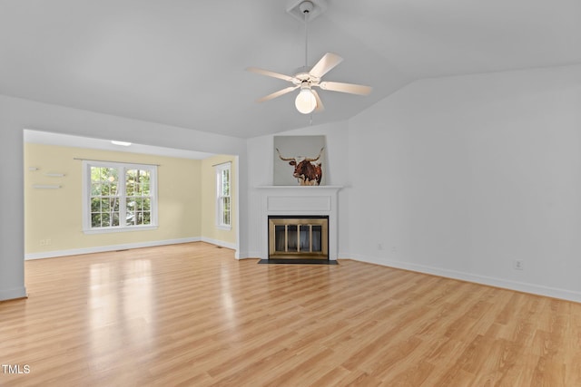 4705 Forest Highland Dr, Raleigh, NC 27604 - unfurnished living room with lofted ceiling, ceiling fan, light wood-style flooring, a fireplace with flush hearth, and baseboards