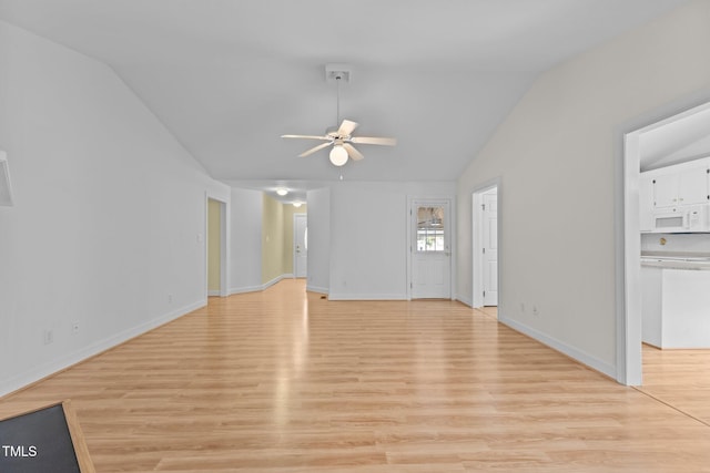 4705 Forest Highland Dr, Raleigh, NC 27604 - unfurnished living room with lofted ceiling, ceiling fan, light wood-style floors, and baseboards