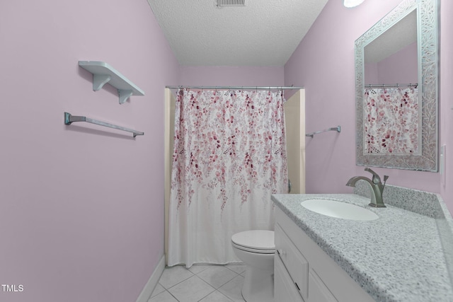4705 Forest Highland Dr, Raleigh, NC 27604 - full bath featuring a textured ceiling, tile patterned floors, vanity, toilet, and curtained shower