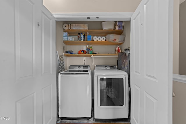 laundry area with separate washer and dryer