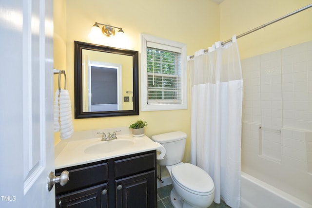 bathroom featuring toilet, vanity, and shower / tub combo