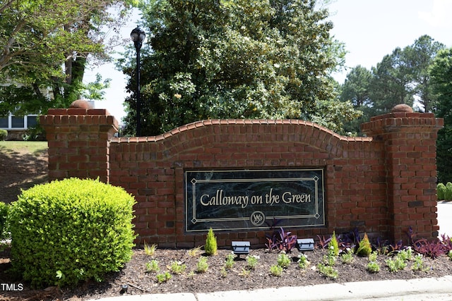 view of community sign