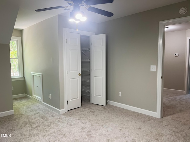 8100 Laurel Mountain Rd, Raleigh, NC 27613 - unfurnished bedroom featuring carpet and a ceiling fan