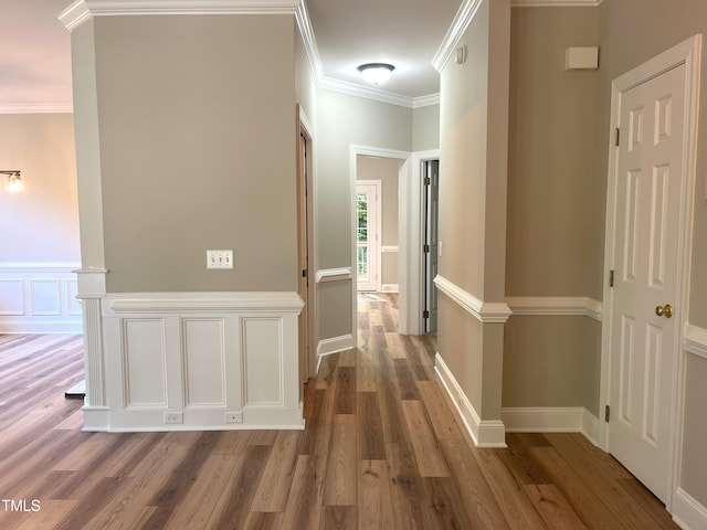 8100 Laurel Mountain Rd, Raleigh, NC 27613 - corridor featuring wood finished floors and crown molding