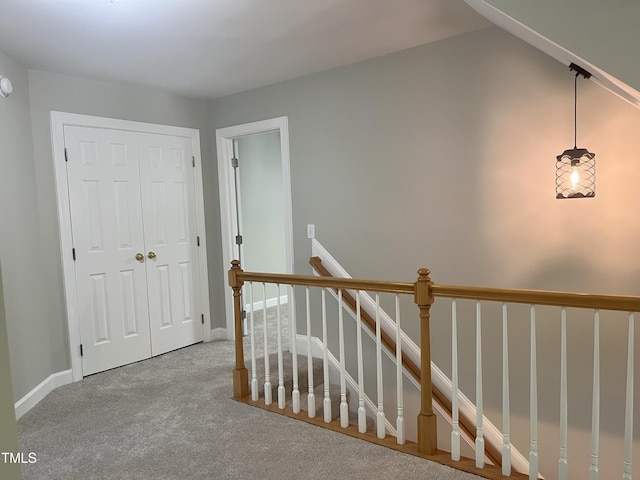 8100 Laurel Mountain Rd, Raleigh, NC 27613 - hall featuring an upstairs landing and carpet flooring
