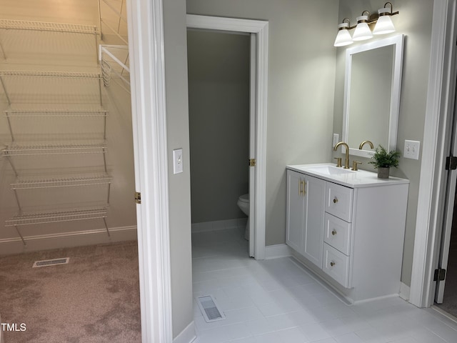 8100 Laurel Mountain Rd, Raleigh, NC 27613 - bathroom with vanity and tile patterned flooring