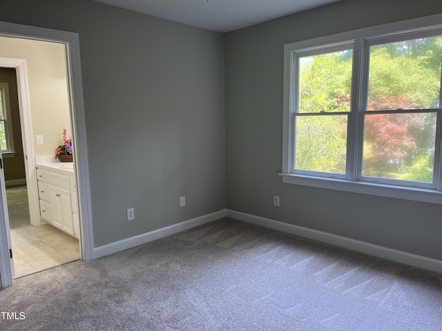 8100 Laurel Mountain Rd, Raleigh, NC 27613 - empty room with light carpet and baseboards