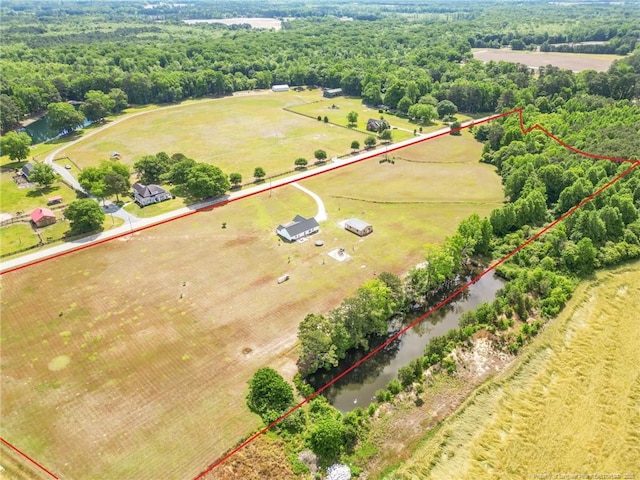 6955 S W St, Godwin, NC 28344 - aerial view of sparsely populated area featuring property parcel outlined and a heavily wooded area