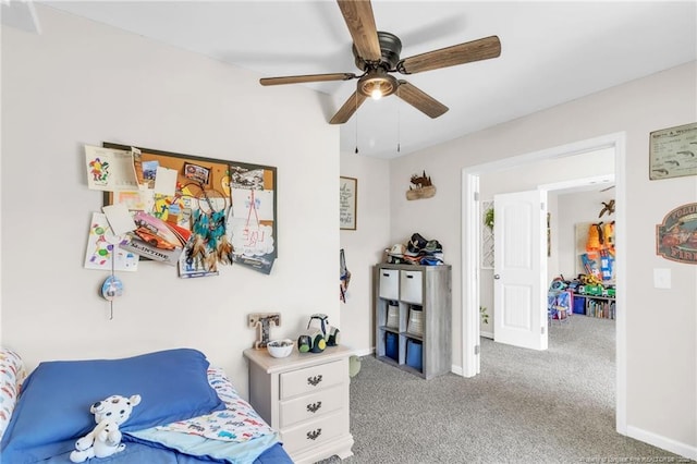 6955 S W St, Godwin, NC 28344 - carpeted bedroom featuring baseboards and ceiling fan