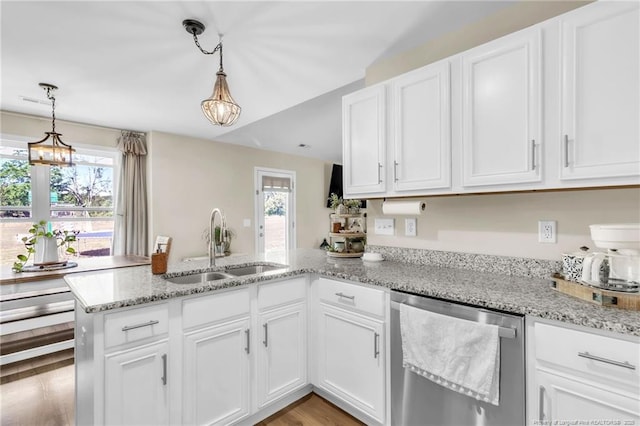 6955 S W St, Godwin, NC 28344 - kitchen featuring dishwasher, a peninsula, a sink, and white cabinetry