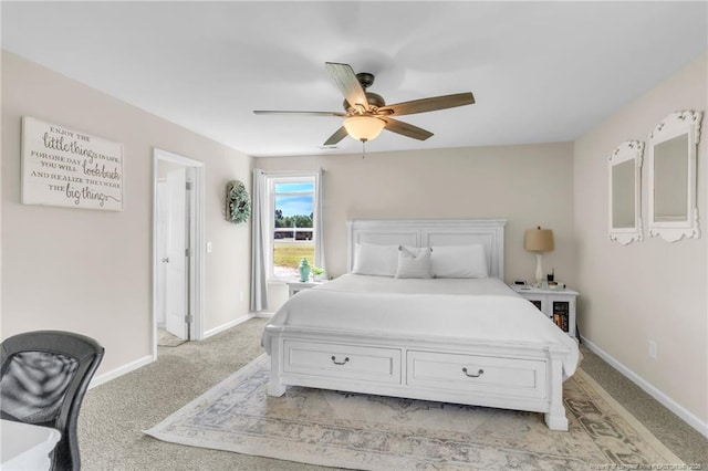 6955 S W St, Godwin, NC 28344 - bedroom with light carpet, baseboards, and ceiling fan