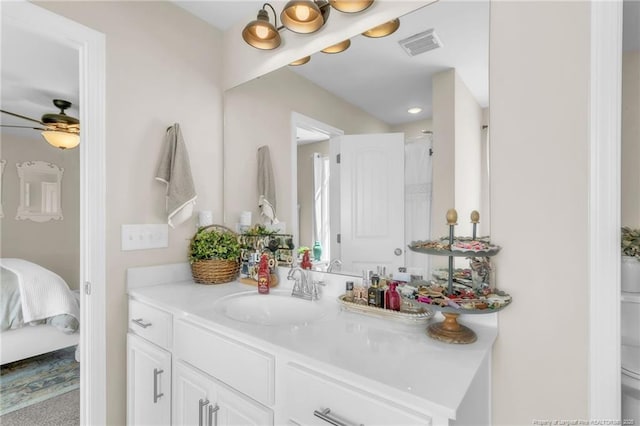 6955 S W St, Godwin, NC 28344 - ensuite bathroom with vanity and ceiling fan