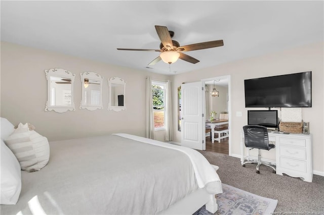 6955 S W St, Godwin, NC 28344 - carpeted bedroom featuring a ceiling fan and an office area