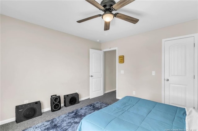 6955 S W St, Godwin, NC 28344 - bedroom featuring dark carpet, baseboards, and a ceiling fan