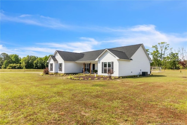 6955 S W St, Godwin, NC 28344 - view of front facade with central AC unit and a front yard
