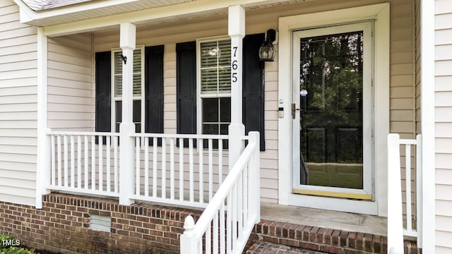 765 S Hollybrook Rd, Wendell, NC 27591 - doorway to property featuring a porch