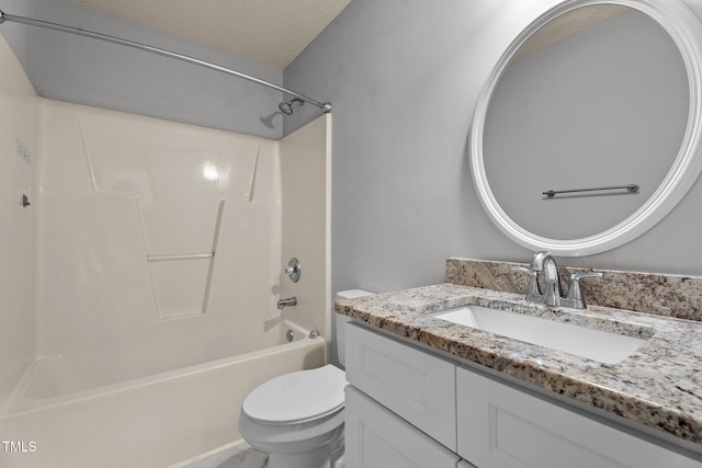 765 S Hollybrook Rd, Wendell, NC 27591 - bathroom featuring tub / shower combination, toilet, vanity, and a textured ceiling