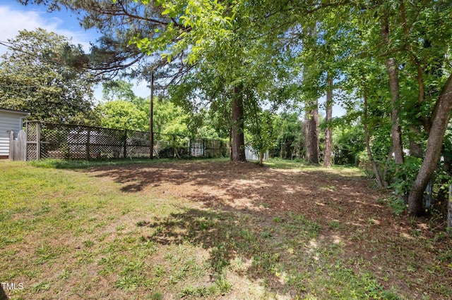 view of yard featuring fence