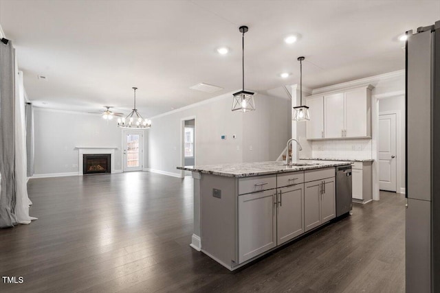 212 Sea Trail St, Hillsborough, NC 27278 - kitchen with appliances with stainless steel finishes, crown molding, a glass covered fireplace, dark wood-style flooring, and open floor plan