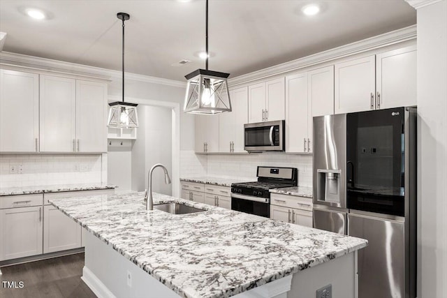 212 Sea Trail St, Hillsborough, NC 27278 - kitchen with appliances with stainless steel finishes, backsplash, an island with sink, crown molding, and light stone countertops