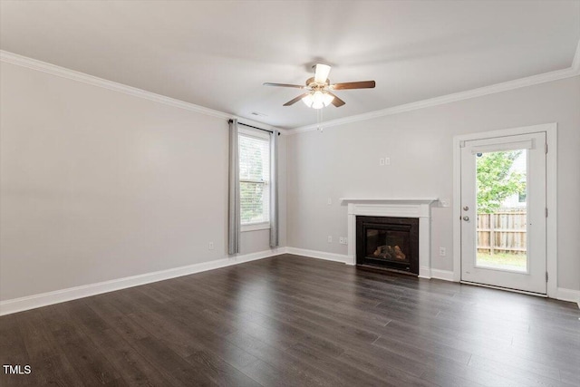 212 Sea Trail St, Hillsborough, NC 27278 - unfurnished living room with plenty of natural light, ceiling fan, ornamental molding, a glass covered fireplace, and dark wood-style floors